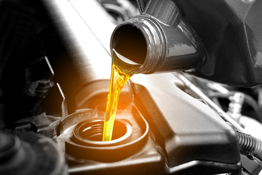 A truck receiving an oil change.