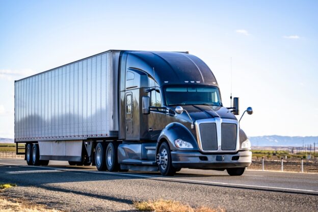 semi truck driving on a highway